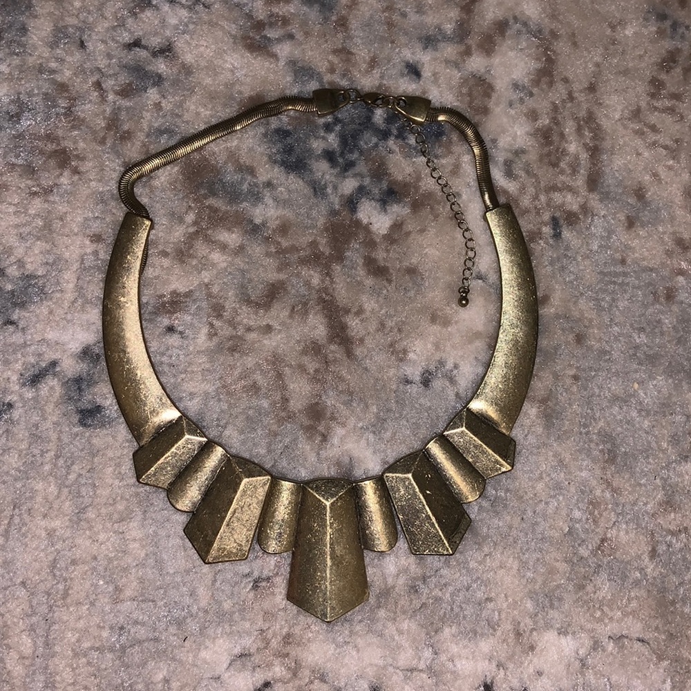 Woman’s gold necklace
